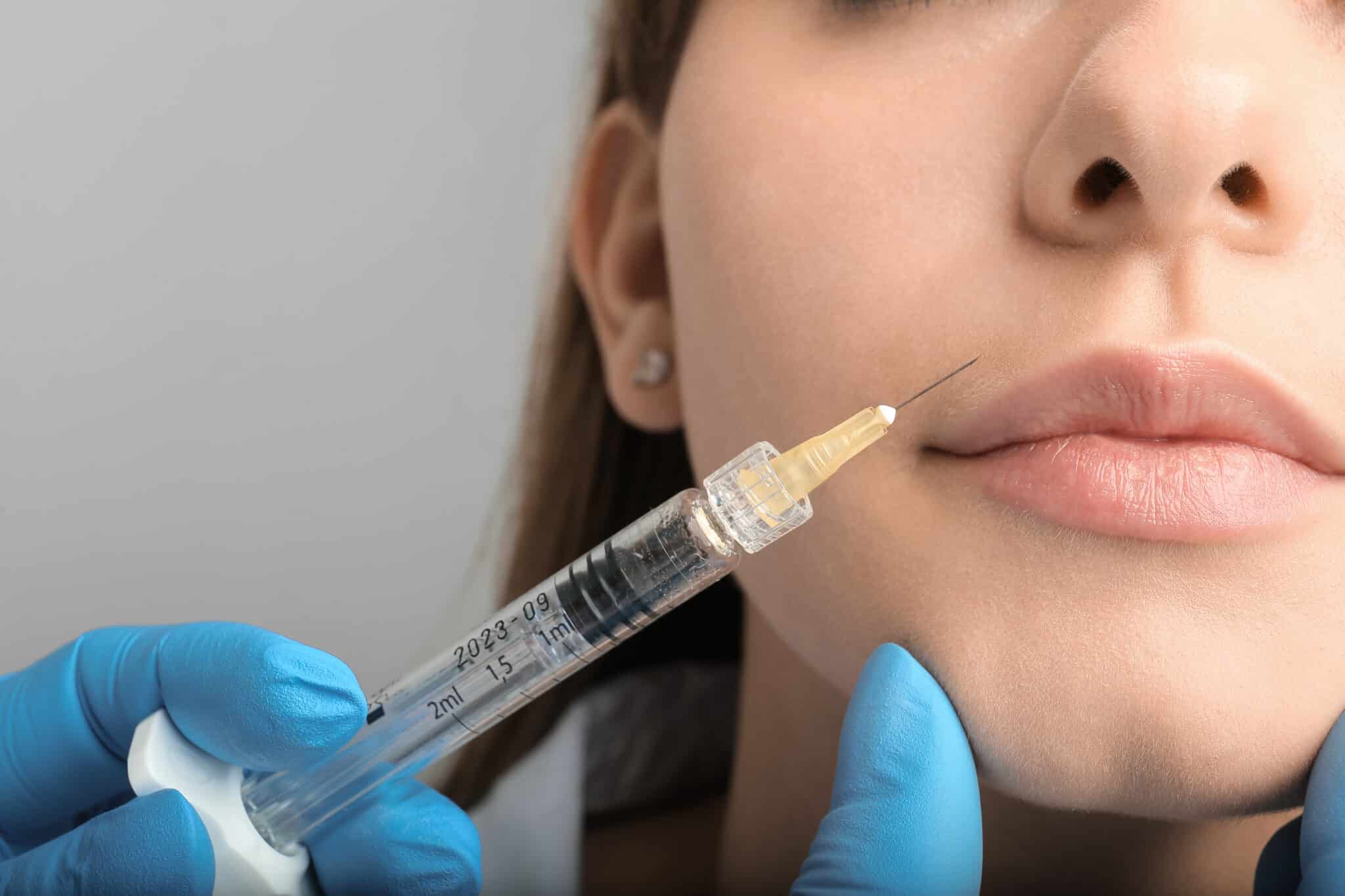 woman getting a facial injection